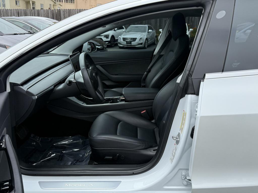 used 2018 Tesla Model 3 car, priced at $16,500