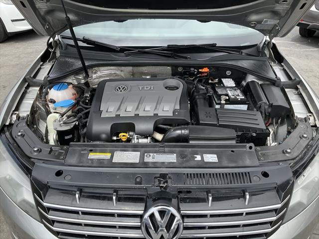 used 2014 Volkswagen Passat car, priced at $7,998