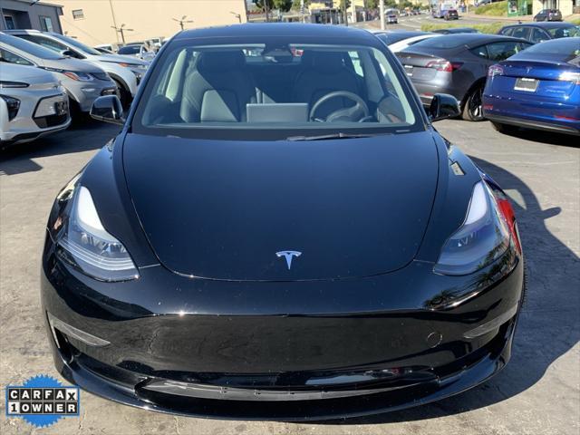 used 2023 Tesla Model 3 car, priced at $26,200