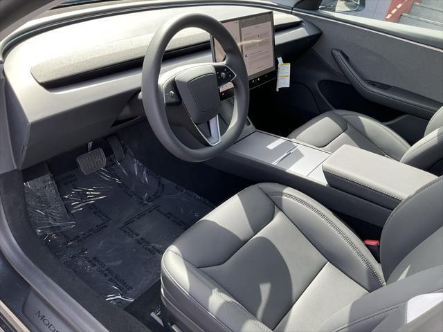 used 2025 Tesla Model 3 car, priced at $38,998