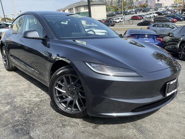 used 2025 Tesla Model 3 car, priced at $38,998