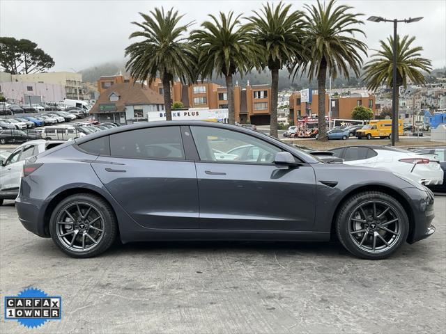 used 2023 Tesla Model 3 car, priced at $19,998