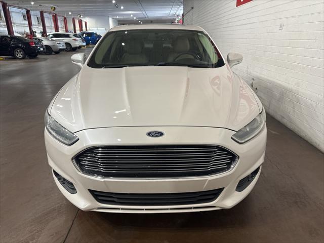 used 2014 Ford Fusion car, priced at $6,999