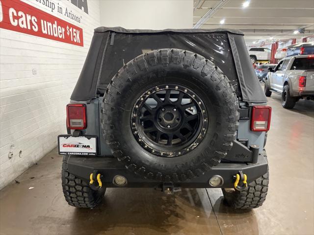 used 2014 Jeep Wrangler car, priced at $21,999