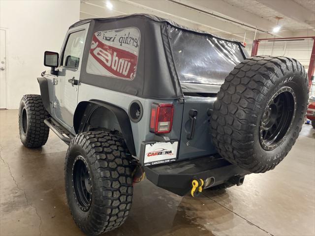 used 2014 Jeep Wrangler car, priced at $21,999