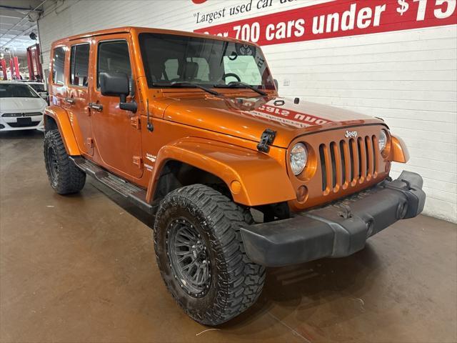 used 2010 Jeep Wrangler Unlimited car, priced at $13,499