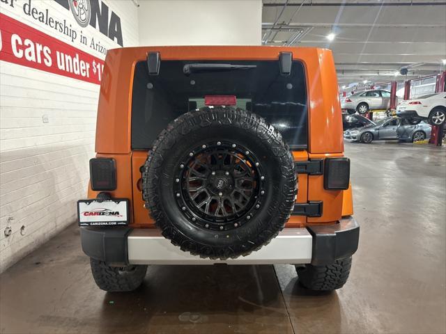 used 2010 Jeep Wrangler Unlimited car, priced at $13,499