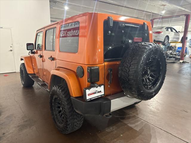 used 2010 Jeep Wrangler Unlimited car, priced at $13,499