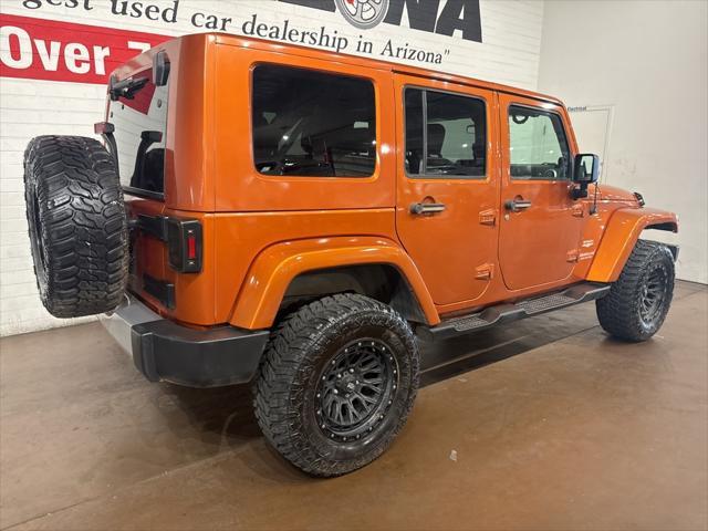 used 2010 Jeep Wrangler Unlimited car, priced at $13,499