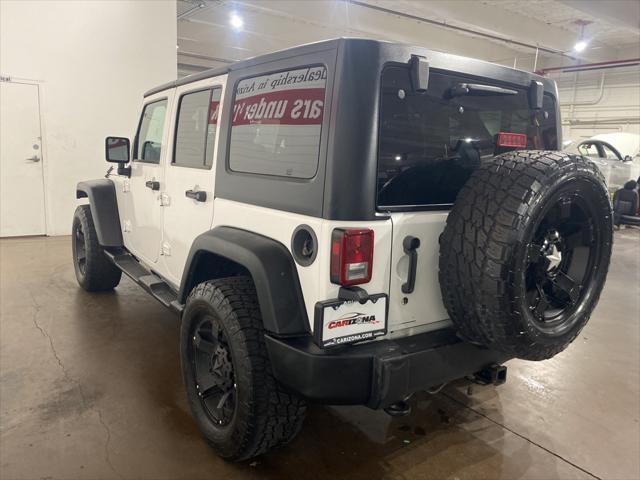 used 2012 Jeep Wrangler Unlimited car, priced at $17,499