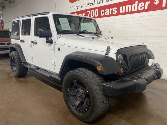 used 2012 Jeep Wrangler Unlimited car, priced at $17,499