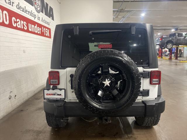 used 2012 Jeep Wrangler Unlimited car, priced at $17,499