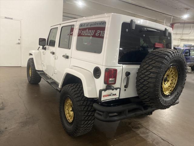 used 2015 Jeep Wrangler Unlimited car, priced at $19,349