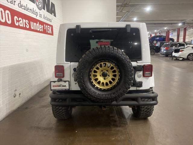 used 2015 Jeep Wrangler Unlimited car, priced at $19,349