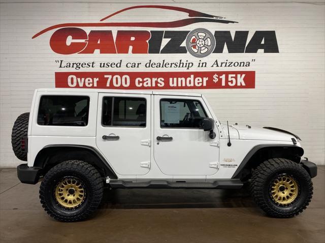 used 2012 Jeep Wrangler Unlimited car, priced at $15,999