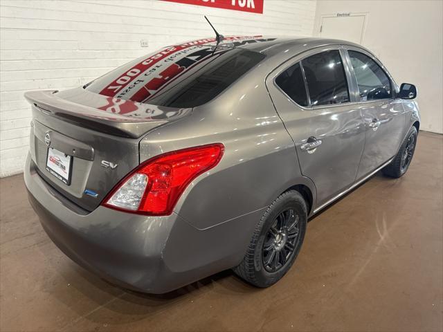 used 2013 Nissan Versa car, priced at $6,999