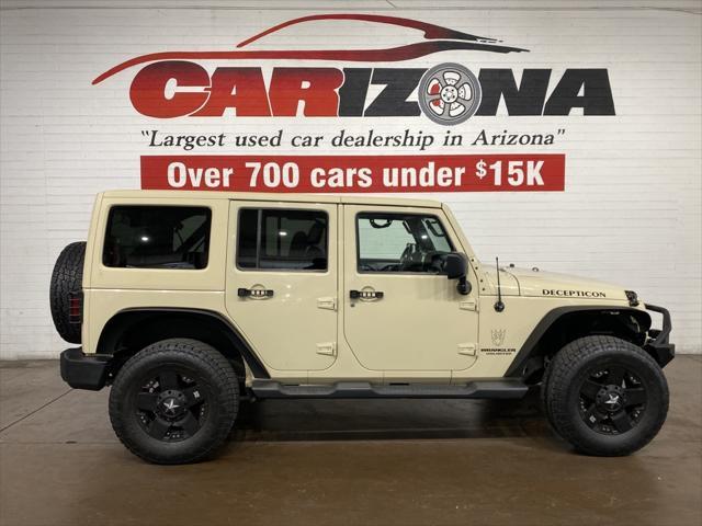 used 2011 Jeep Wrangler Unlimited car, priced at $16,499