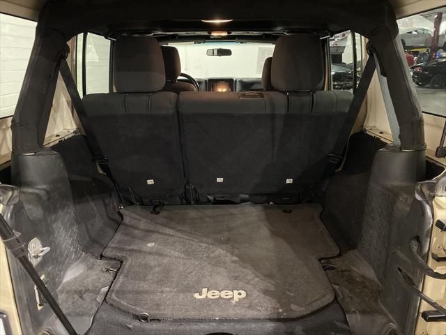 used 2011 Jeep Wrangler Unlimited car, priced at $16,499