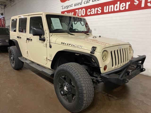 used 2011 Jeep Wrangler Unlimited car, priced at $16,499