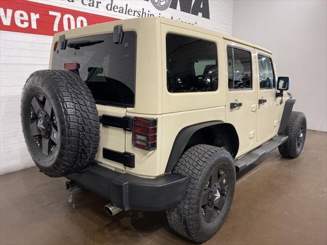 used 2011 Jeep Wrangler Unlimited car, priced at $16,499