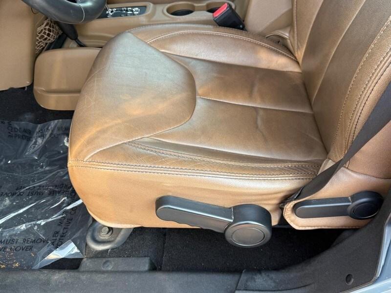 used 2014 Jeep Wrangler Unlimited car, priced at $13,871