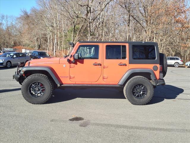 used 2013 Jeep Wrangler Unlimited car, priced at $13,850