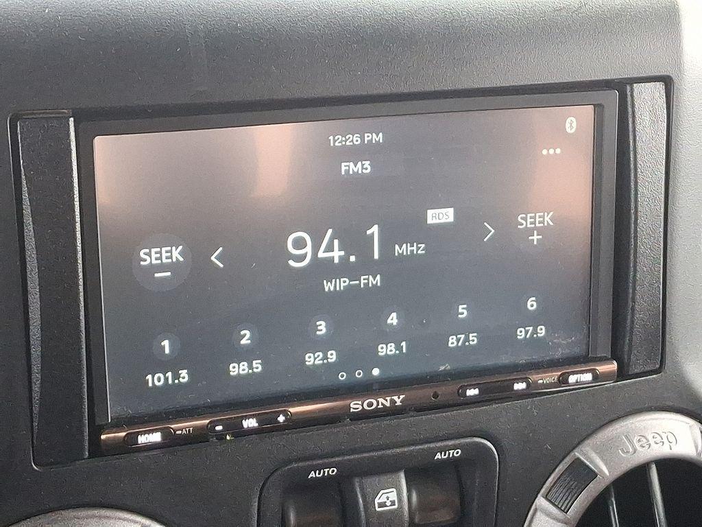 used 2015 Jeep Wrangler car, priced at $13,173