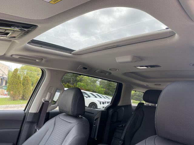 new 2025 Kia Carnival Hybrid car, priced at $56,066