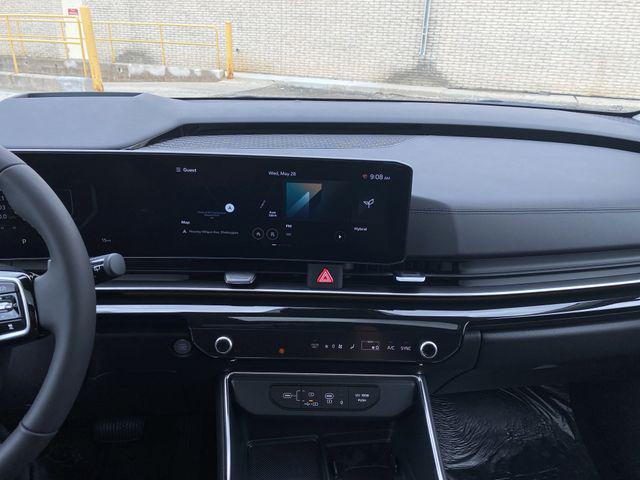 new 2025 Kia Carnival Hybrid car, priced at $56,066