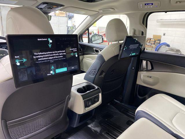 new 2025 Kia Carnival Hybrid car, priced at $55,057