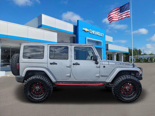 used 2016 Jeep Wrangler Unlimited car, priced at $25,991