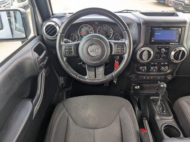 used 2016 Jeep Wrangler Unlimited car, priced at $25,991