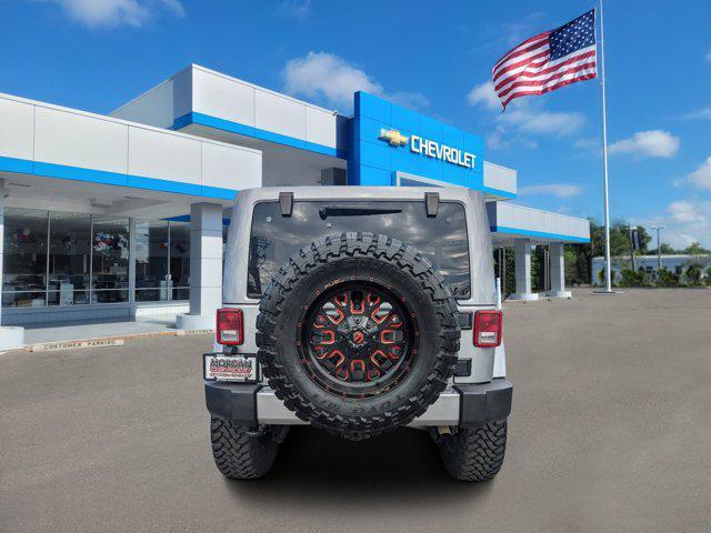 used 2016 Jeep Wrangler Unlimited car, priced at $25,991