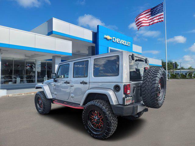 used 2016 Jeep Wrangler Unlimited car, priced at $25,991