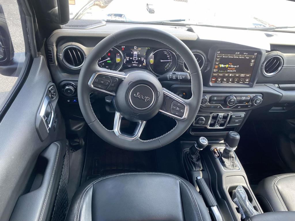 used 2023 Jeep Wrangler 4xe car, priced at $34,999