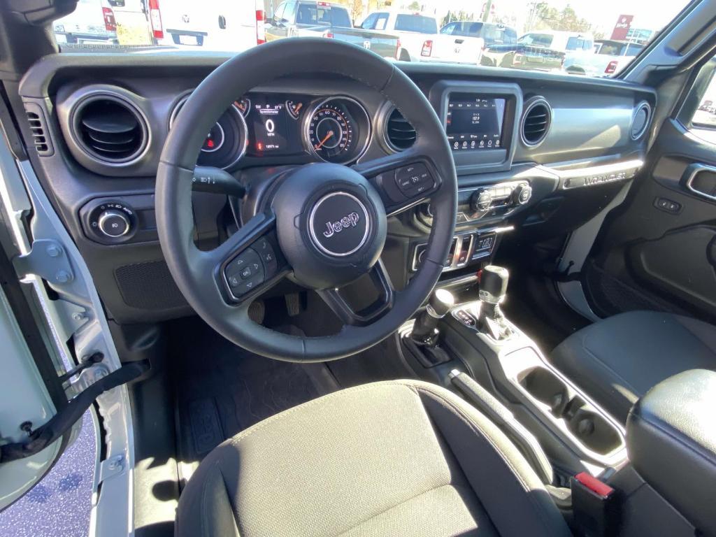 used 2023 Jeep Wrangler car, priced at $31,390