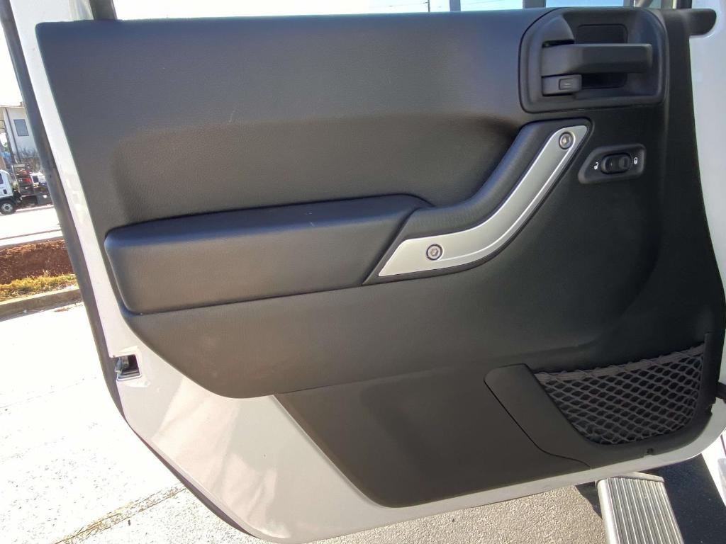 used 2015 Jeep Wrangler Unlimited car, priced at $24,977