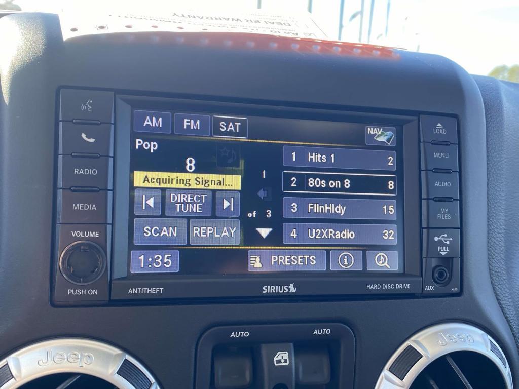 used 2015 Jeep Wrangler Unlimited car, priced at $24,977