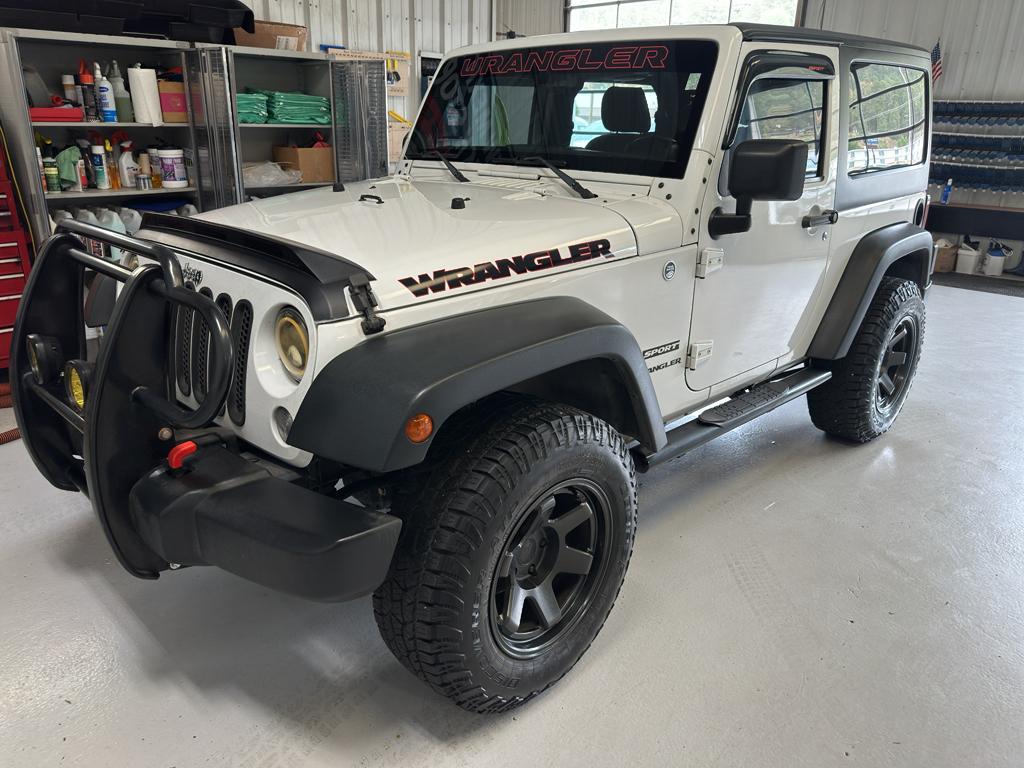 used 2014 Jeep Wrangler car, priced at $13,263