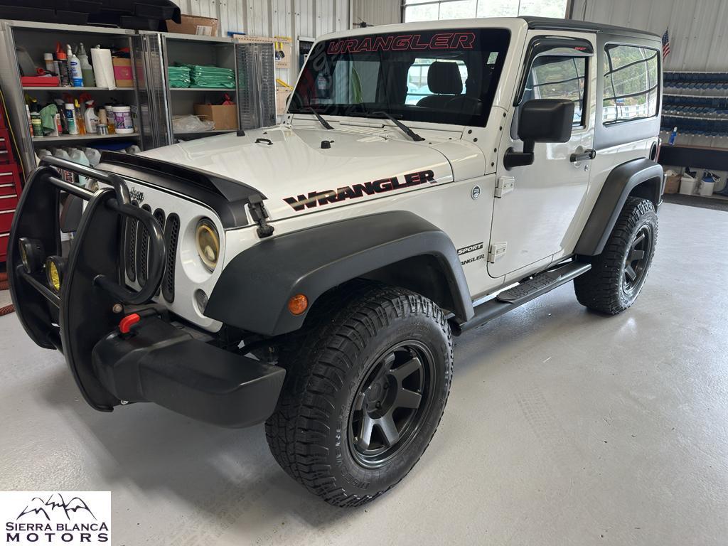 used 2014 Jeep Wrangler car, priced at $12,984