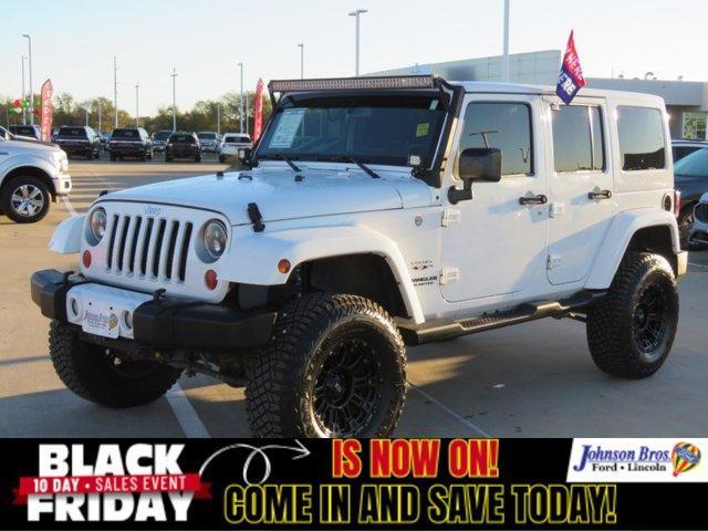 used 2016 Jeep Wrangler Unlimited car, priced at $23,619