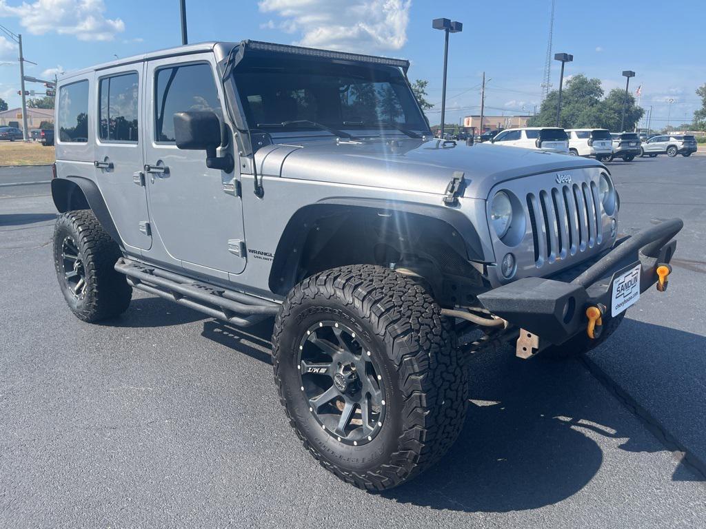 used 2014 Jeep Wrangler Unlimited car, priced at $16,770