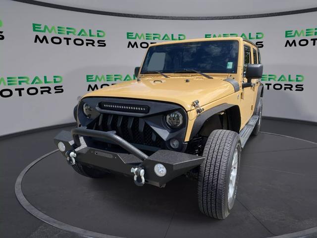 used 2014 Jeep Wrangler Unlimited car, priced at $18,371