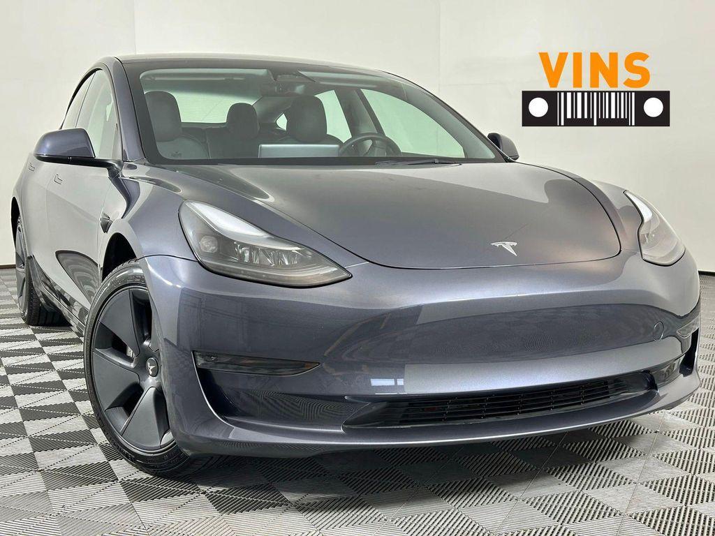 used 2023 Tesla Model 3 car, priced at $27,980