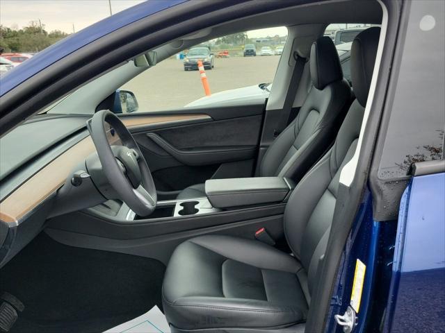 used 2024 Tesla Model Y car, priced at $34,980