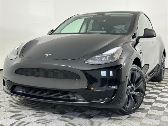 used 2024 Tesla Model Y car, priced at $34,980