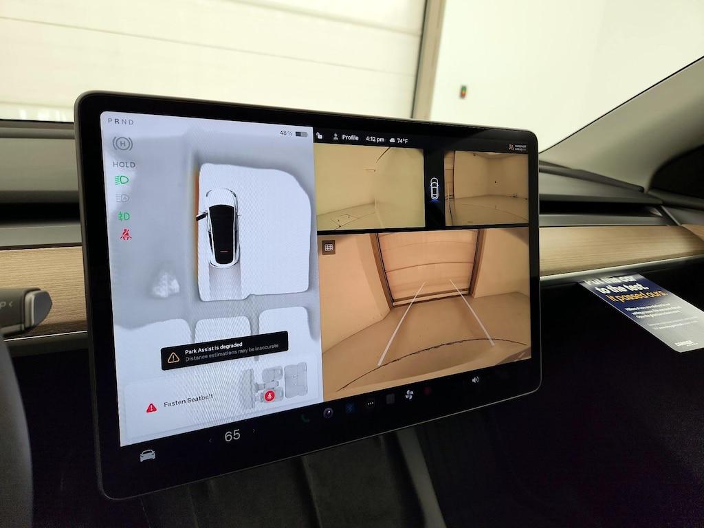 used 2024 Tesla Model Y car, priced at $39,998