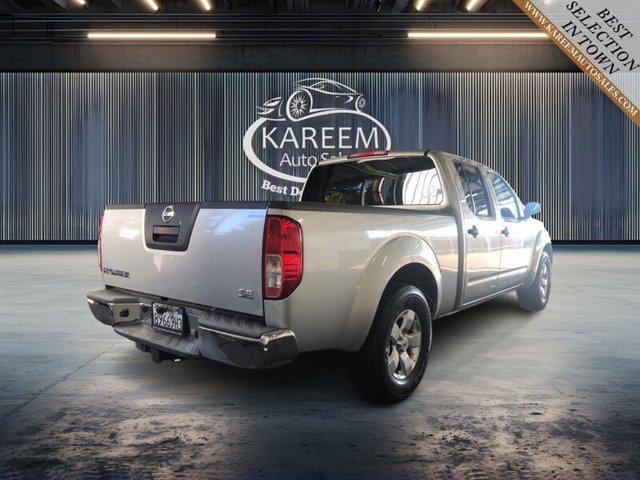 used 2010 Nissan Frontier car, priced at $12,485