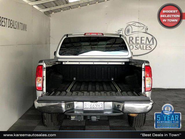 used 2010 Nissan Frontier car, priced at $13,645