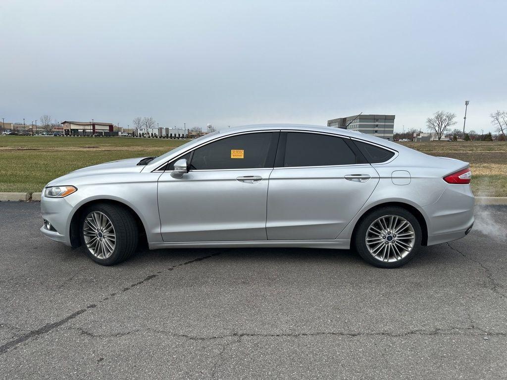 used 2016 Ford Fusion car, priced at $10,000